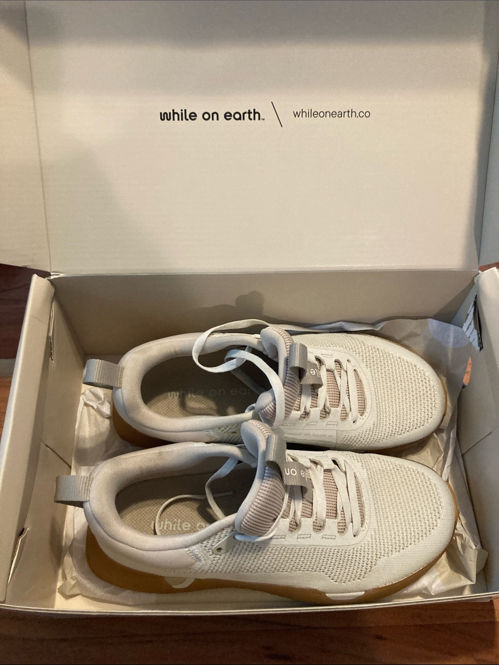 New with box 
While On Earth 
 Women's Cream Knit move trainer  with Gum Sole
